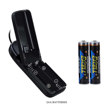 Open battery compartment with two AA batteries beside