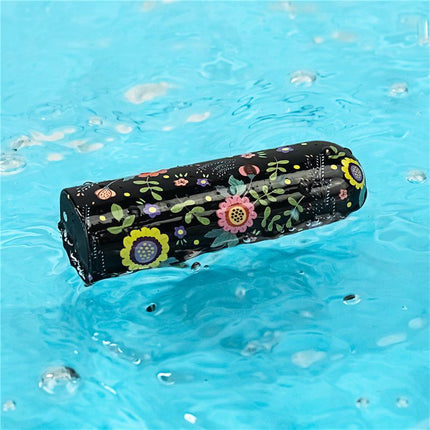Vibrating Bullet Diana floating in water, showcasing compact size and floral design for discreet pleasure and portability.