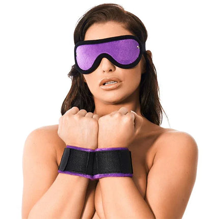 Woman wearing Handcuffs with Mask Adjustable Purple, showing soft-nylon restraint set.