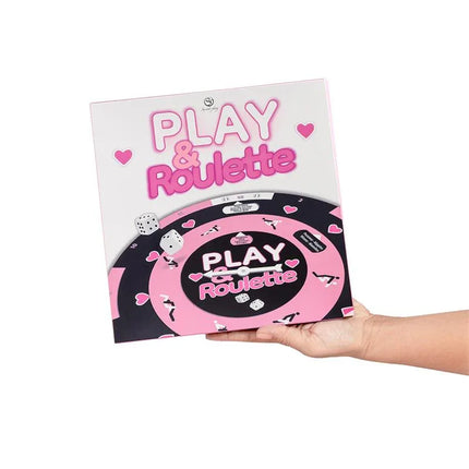 Play & Roulette (ES/PT/EN/FR) box held by hand, exciting table game for enhancing love life and passion in multiple languages.