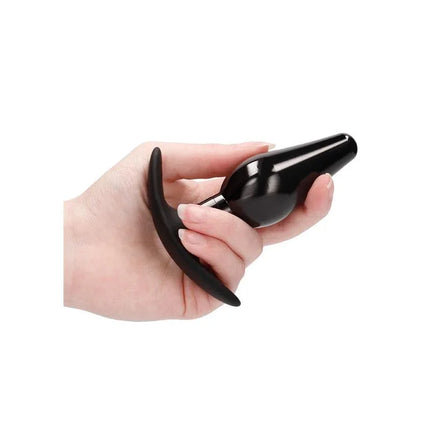 Butt Plug Set Pointed Large Suction Cup Black with ergonomic handle held in hand for anal stimulation