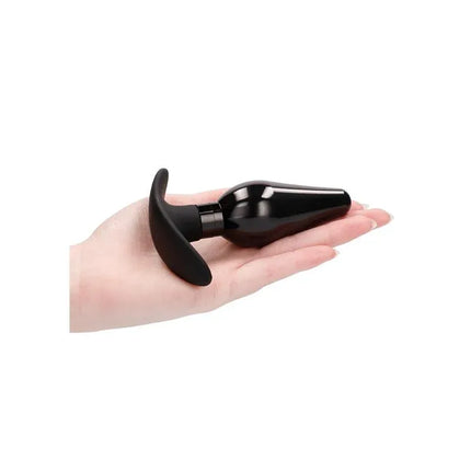 Butt Plug Set Pointed Large Suction Cup Black held in hand, showcasing ergonomic design and high-quality materials for enhanced anal play.