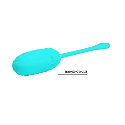 Vibrating Egg Kirk Silicone USB in turquoise with charging hole detail, ideal for discreet pleasure and portable use. Body-safe design.
