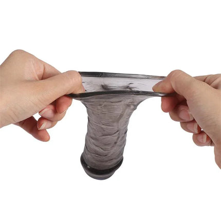 Hands stretching Pack 3 Pennis Sleeve Alex Black showing flexibility and texture