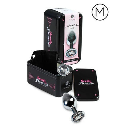 Butt Plug Size M Clear with packaging, nickel-free aluminum design, ideal for solo or couple play, medium size for comfort.