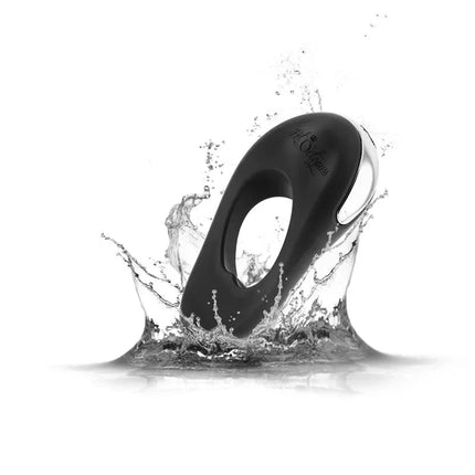 Atom Plus Virbrating Penis Ring and Perianal Stimulator Black in water splash showcasing waterproof design.