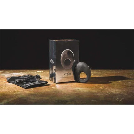 Vibrating Penis Ring Atom Black packaging and product on display