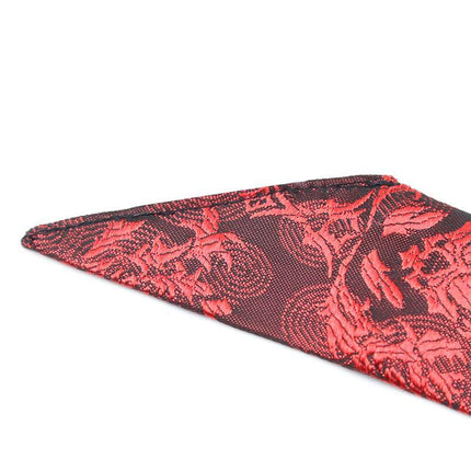 Close-up of red and black patterned fabric part of the Silicone Ball Gag Red/Black showcasing intricate design.