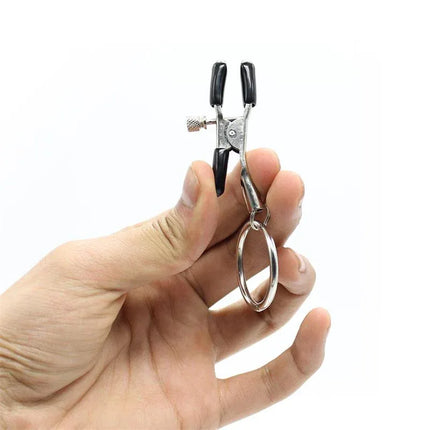 Hand holding adjustable Nipple Clamp with O Ring Metal from Latetobed BDSM Line, durable and bold.