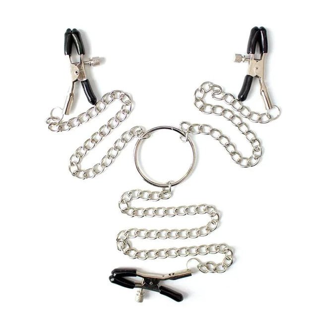 Metal nipple clamps and clit clamps with chain, part of BDSM set for adventurous play.