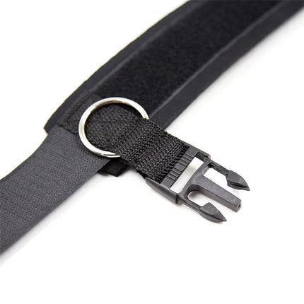 Close-up of black Neoprene Handcuffs with Veldro, showing adjustable Velcro strap and secure clasp for restraint play.
