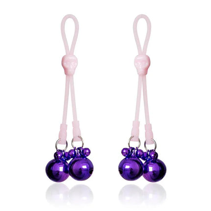 Nipple Clamps Skulls and Ring Bells Silicone and Metal Pink/Purple, featuring skull design and purple bells for intense experience.