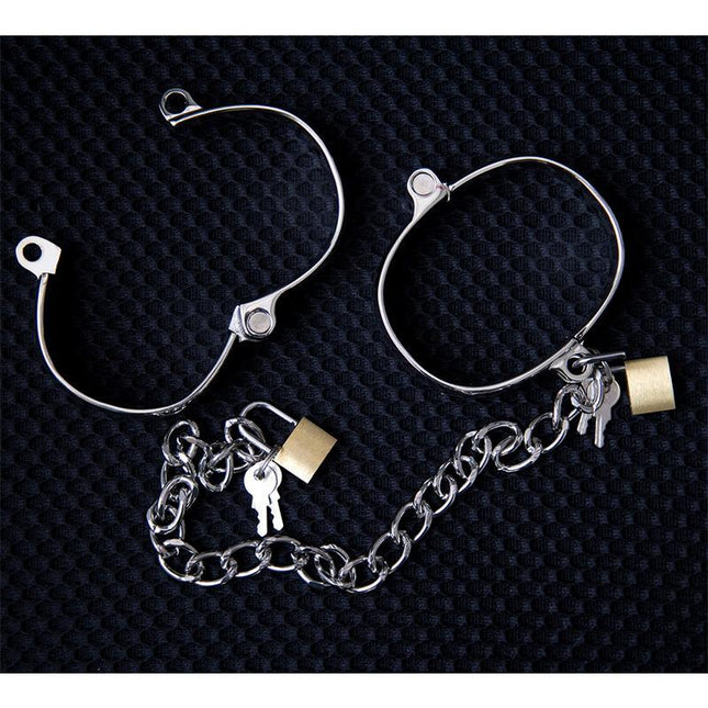Metal Ankle Cuff for Women 8 cm with sturdy chain and padlocks on a textured black surface