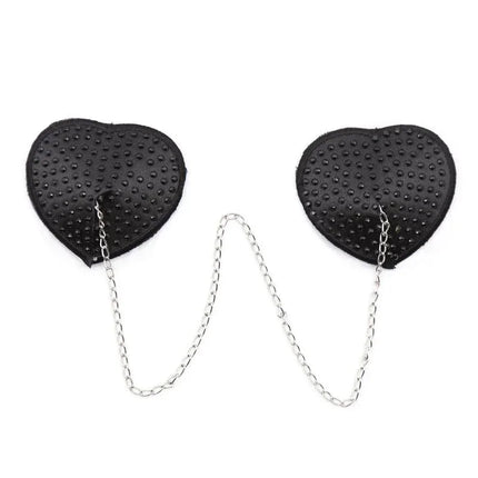 Nipple Covers with Metal Chain Black featuring heart-shaped design and connected metal chain from Latetobed BDSM Line.