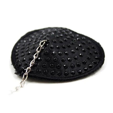 Nipple Covers with Metal Chain Black, heart-shaped, self-adhesive accessory from Latetobed BDSM Line, bold and immersive design.
