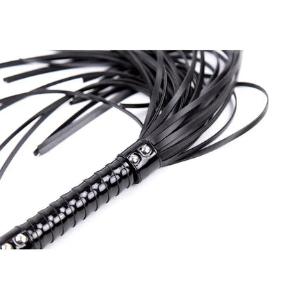 Shinny Handle Flogger 44 cm Black with glossy ergonomic handle for precise BDSM play in black color.