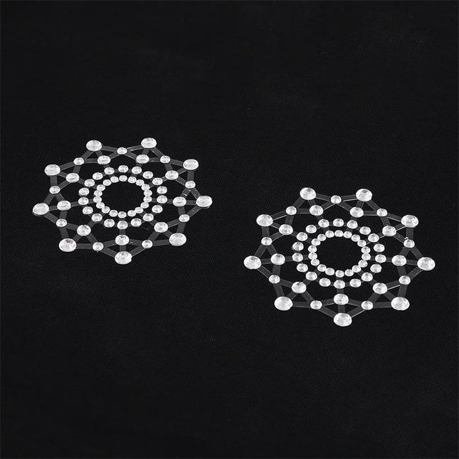 Snowflake Nipple Covers White, self-adhesive snowflake-shaped nipple covers, BDSM accessories in white for secure wear and daring edge.