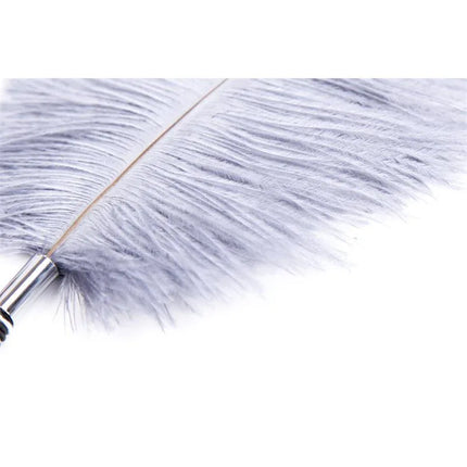 Close-up of Feather Tickler with Wrapped 46 cm Black/White, showing soft, silky feathers for sensory play.