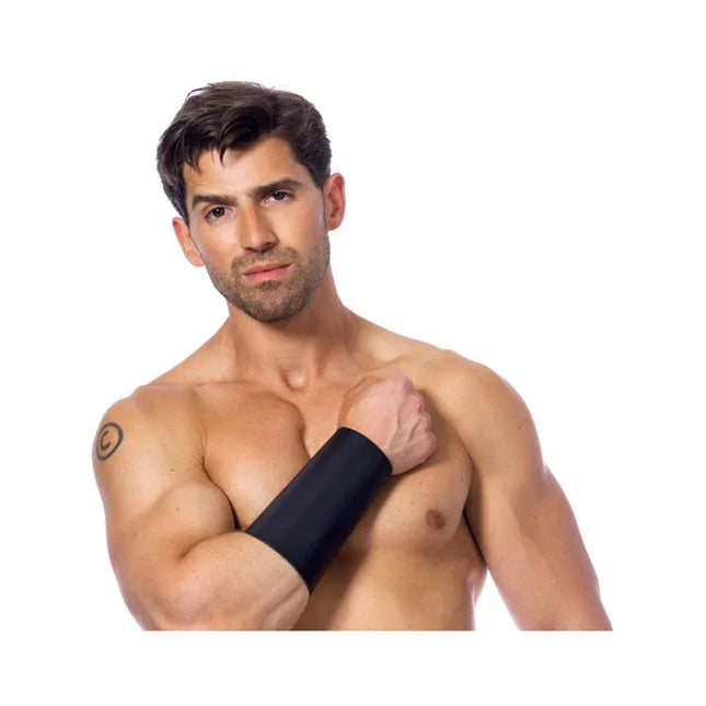 Man wearing Gauntlet-Adjustable leather wristband, showcasing fit and style. Ideal for BDSM, durable, black color. Shop now!