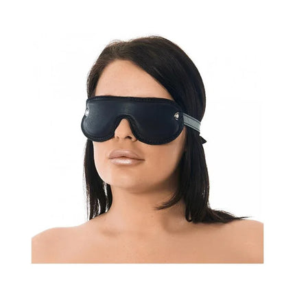 Person wearing Blindfold-Adjustable leather mask with back strap for a secure fit, perfect for sensory play and blackout moments.