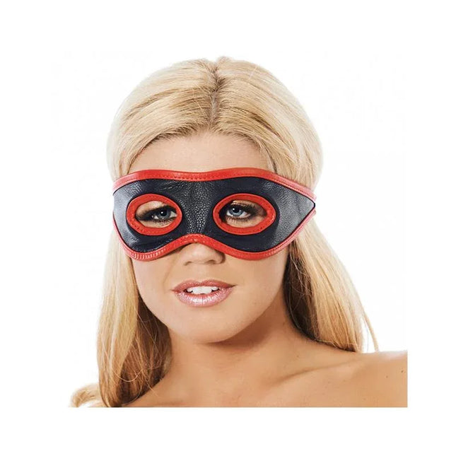 Eyemask-Adjustable leather eye mask with red border and eye openings worn by a model for intimate style and comfort.
