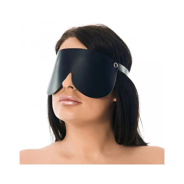 Blindfold-Adjustable premium leather blindfold in black with secure metal buckle, worn for sensory play and total darkness.
