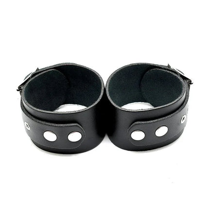 Leather Cuffs Adjustable - genuine leather black cuffs with buckles for comfort and intimate restraint.
