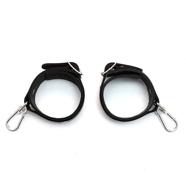 Leather Cuffs Adjustable black leather restraints with metal buckles, crafted for comfort and durability.