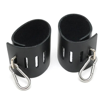 Cuffs-Adjustable black leather cuffs with carabine hooks for secure restraint and quick release, ideal for couples' role-play.