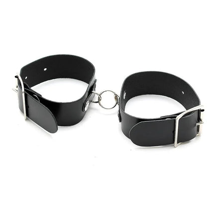 Cuffs Adjustable leather restraint with sleek black finish for playful intimacy.