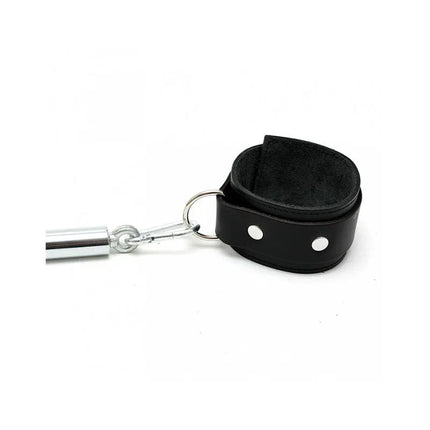 Cuffs with Spreadbar Adjustable featuring a black leather cuff and metal spread bar for secure restraint and customizable configurations.