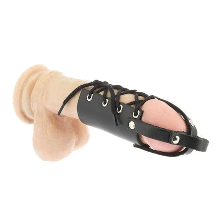 Black leather Harness Penis Tube Adjustable worn on a dildo for longer-lasting erections.