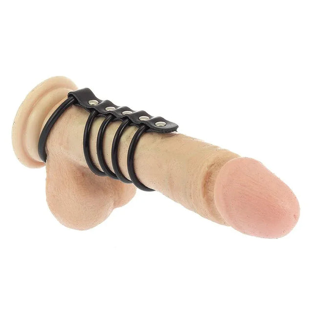 Realistic model wearing the Penis Tube rubber cock ring for enhanced pleasure in black, showcasing durability and size options for various fits.