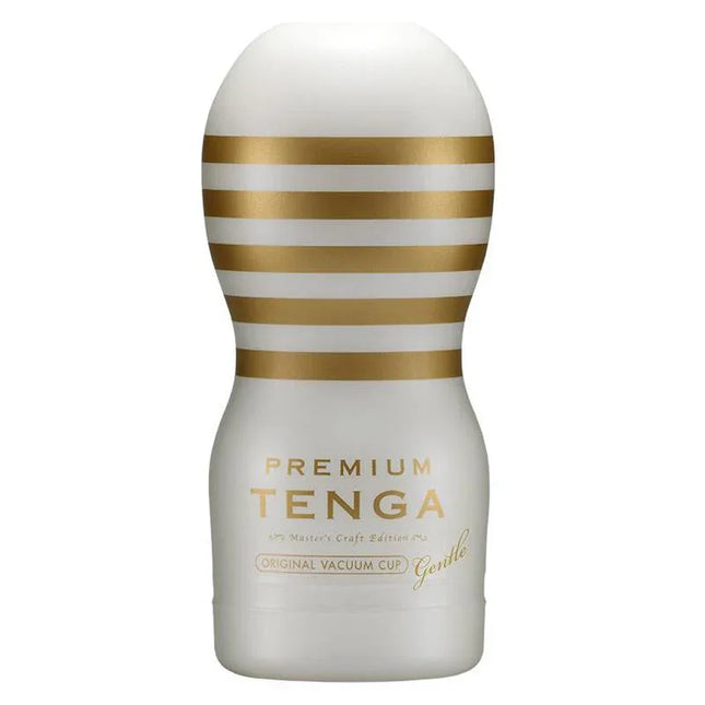 Masturbator Premium Tenga Original Vacuum Cup Gentle with elegant gold stripes on white background