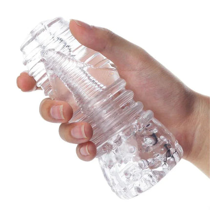 Hand holding the Hannx1 Ultimate Handjob Stroker Open Concept 5.9, showcasing its texture and open-ended design.