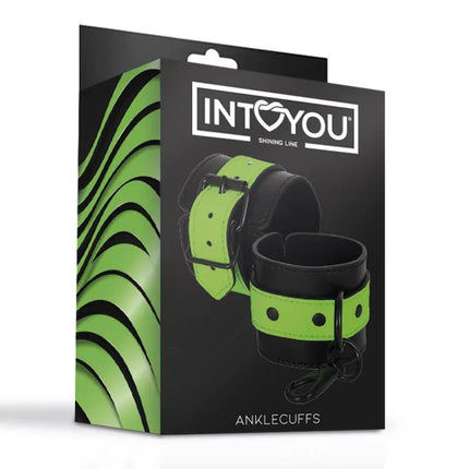 Packaging of Glow in the Dark Anklecuffs from Intoyou, featuring green vegan leather cuffs designed for comfort and fetish expression.