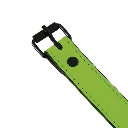 Close-up of Glow in the Dark Breathable Ball Gag's green strap with buckle fastener.