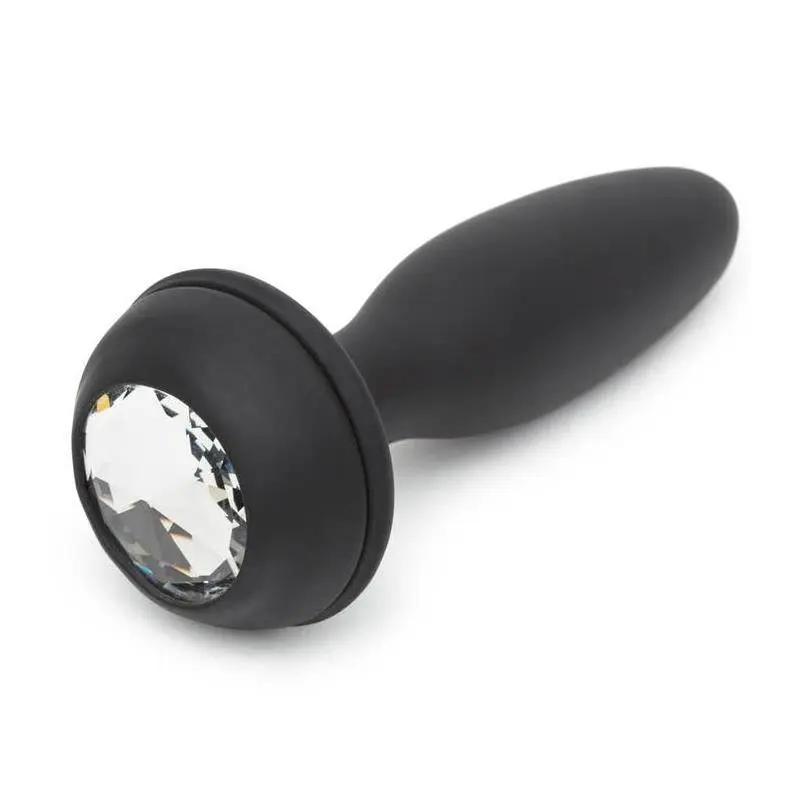 Large black silicone anal plug with double base and clear crystal accent on base.