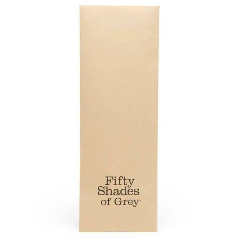 Beige rectangular box packaging with "Fifty Shades of Grey" printed in black text on the front.