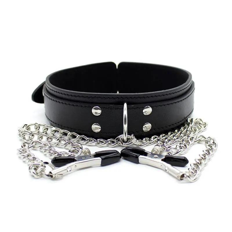 Black leather collar with silver O-ring, attached silver chains, and metal nipple clamps with black tips.