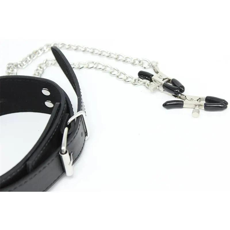 Black leather collar with silver buckle and attached metal chain with black-tipped nipple clamps.