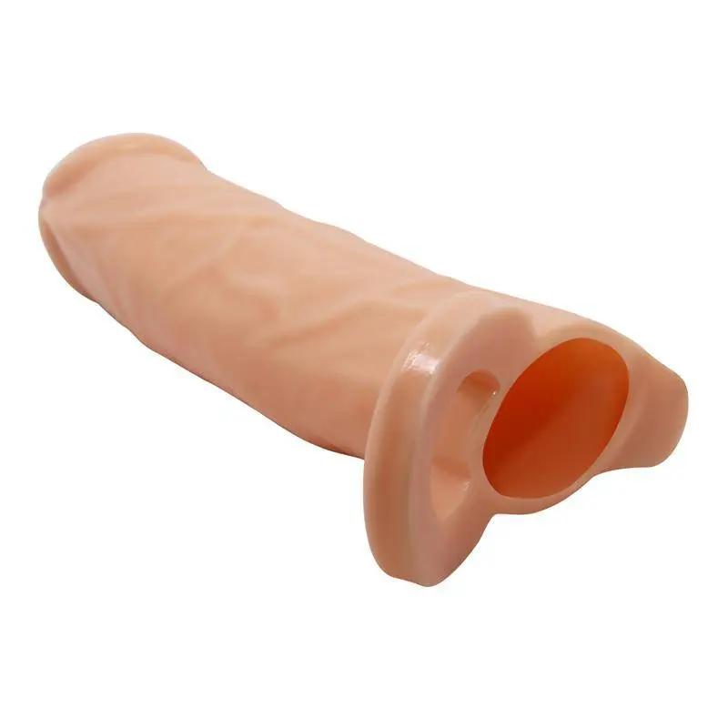 Flesh-toned soft silicone penis sleeve with realistic texture and open base ring.