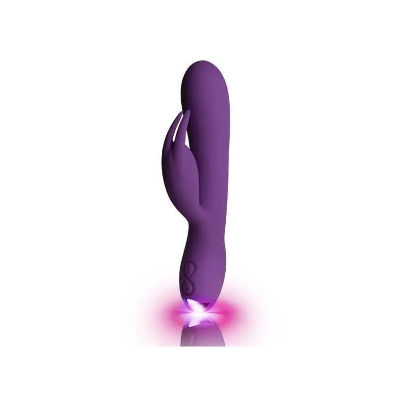 Purple silicone dual-motor rabbit vibrator with curved shaft and flexible clitoral stimulator.