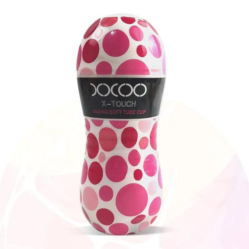 White and pink polka dot soft silicone vibrating male masturbator cup with black XOXO band.