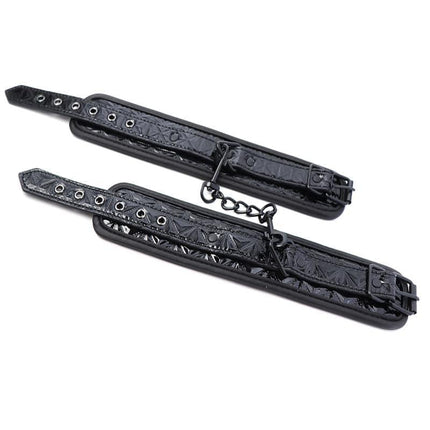 Adjustable Handcuffs Sapphire Vegan Leather with secure black design and robust construction for comfortable restraint.