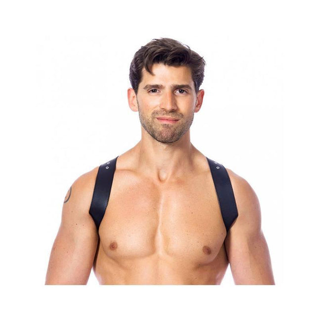 Man wearing Adjustable Leather Harness with cross-style and four buckles for secure fit and comfort.