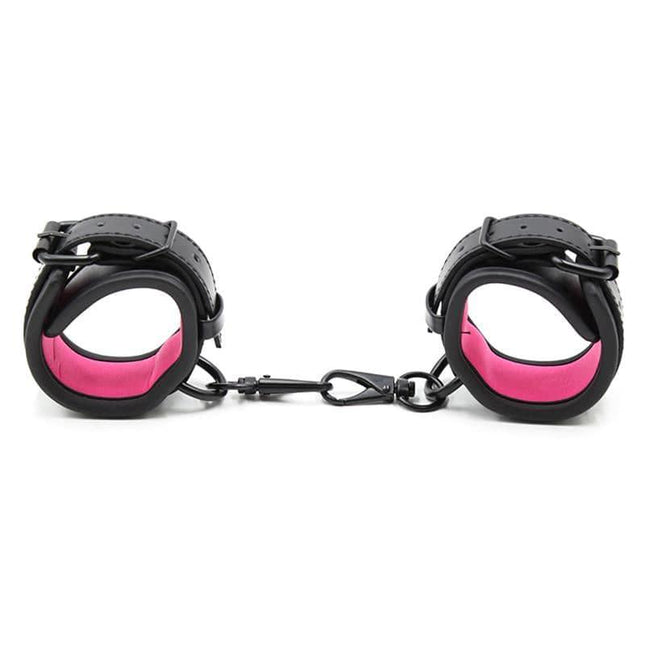 Adjustable Neoprene Handcuffs with pink interior and removable chain for comfortable, versatile restraint from Latetobed BDSM Line.