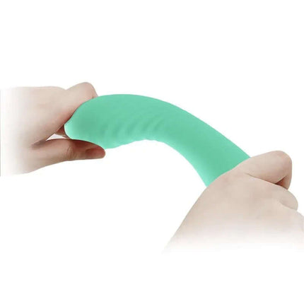 Flexible Alexisrose Vibrator Full Silicone in teal showing bendability and soft texture for targeted pleasure.