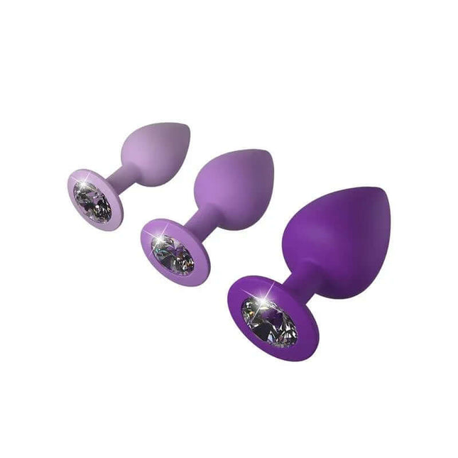 Anal Plug Trainer Set - 3-piece silicone kit with small, medium, and large sizes featuring gem-accented bases for progressive anal play.