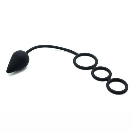 Anal Plug with Penis Rings Silicone, black, body-safe, featuring a three-ring system for enhanced stimulation and secure play.
